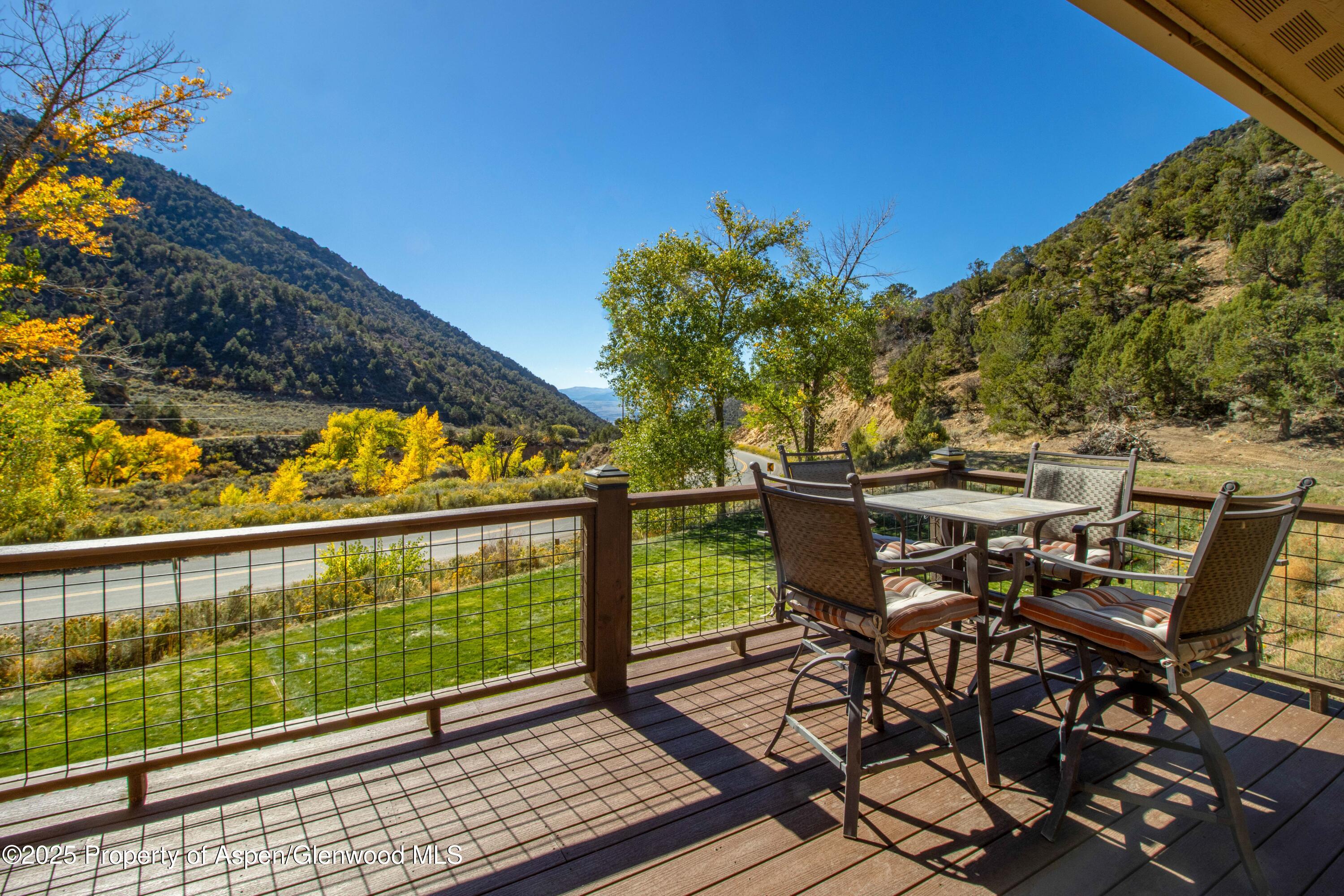 3211 County Road 237 Rifle, CO 81650 - Photo 14 of 56 a view of a chairs and table on the terrace