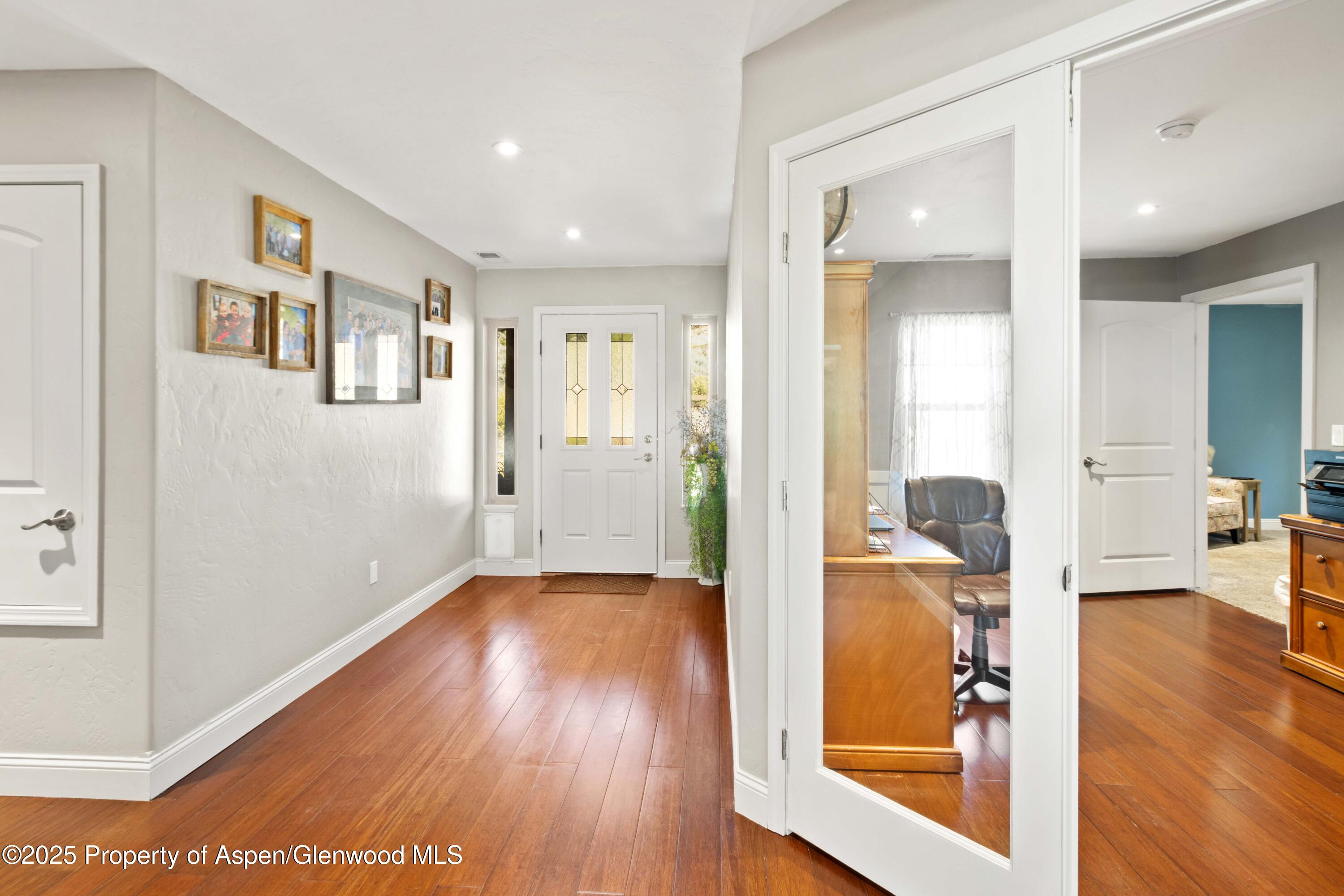 3211 County Road 237 Rifle, CO 81650 - Photo 22 of 56 a view of livingroom with furniture and wooden floor