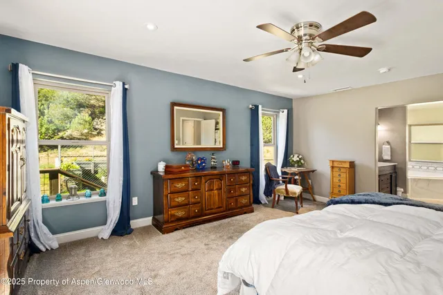 a bathroom with a tub sink and a toilet