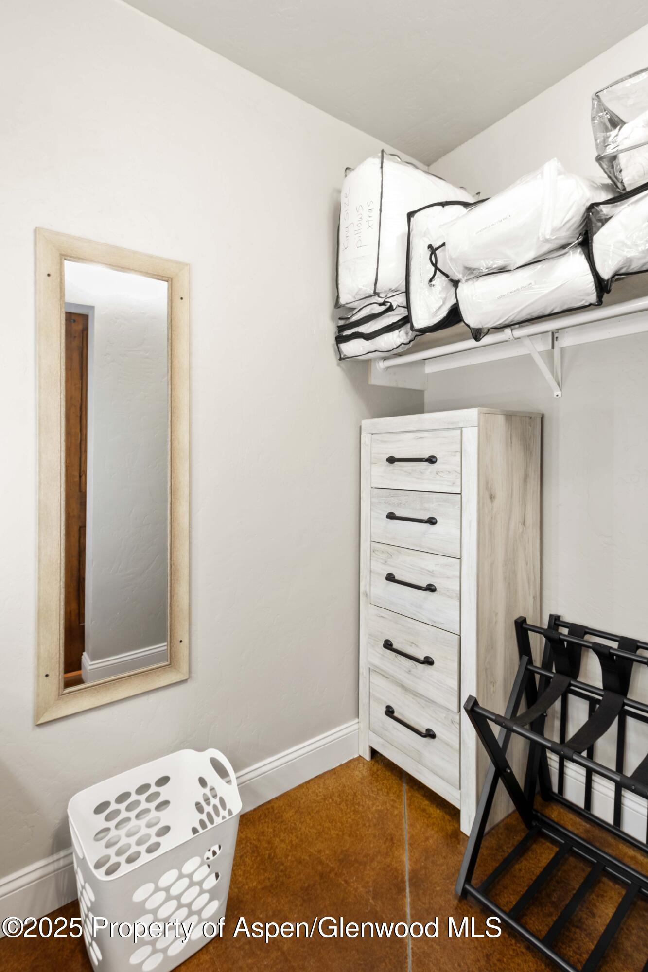 3211 County Road 237 Rifle, CO 81650 - Photo 44 of 56 a view of a bedroom with furniture and wooden floor