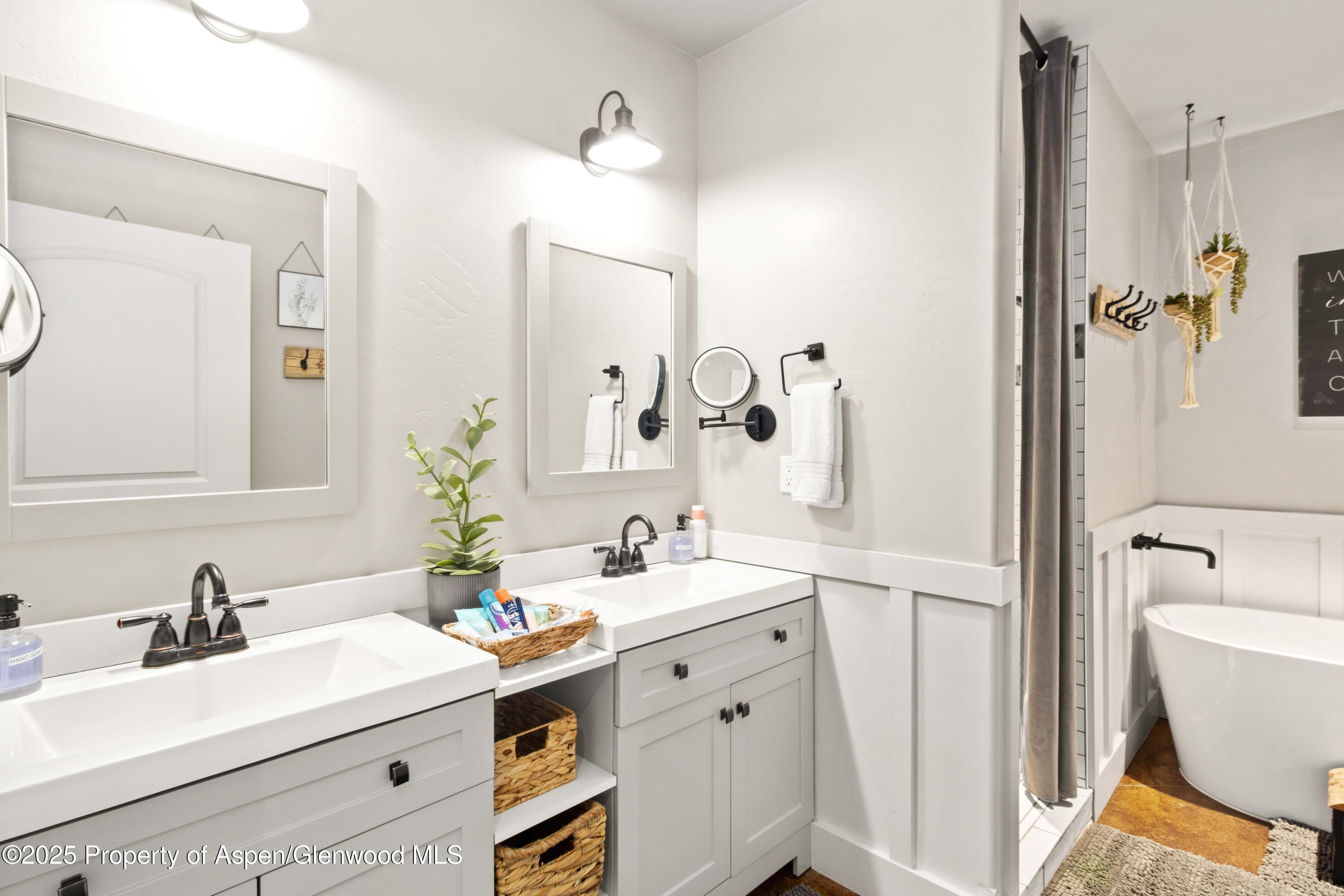 3211 County Road 237 Rifle, CO 81650 - Photo 48 of 56 a bathroom with a sink vanity toilet and shower