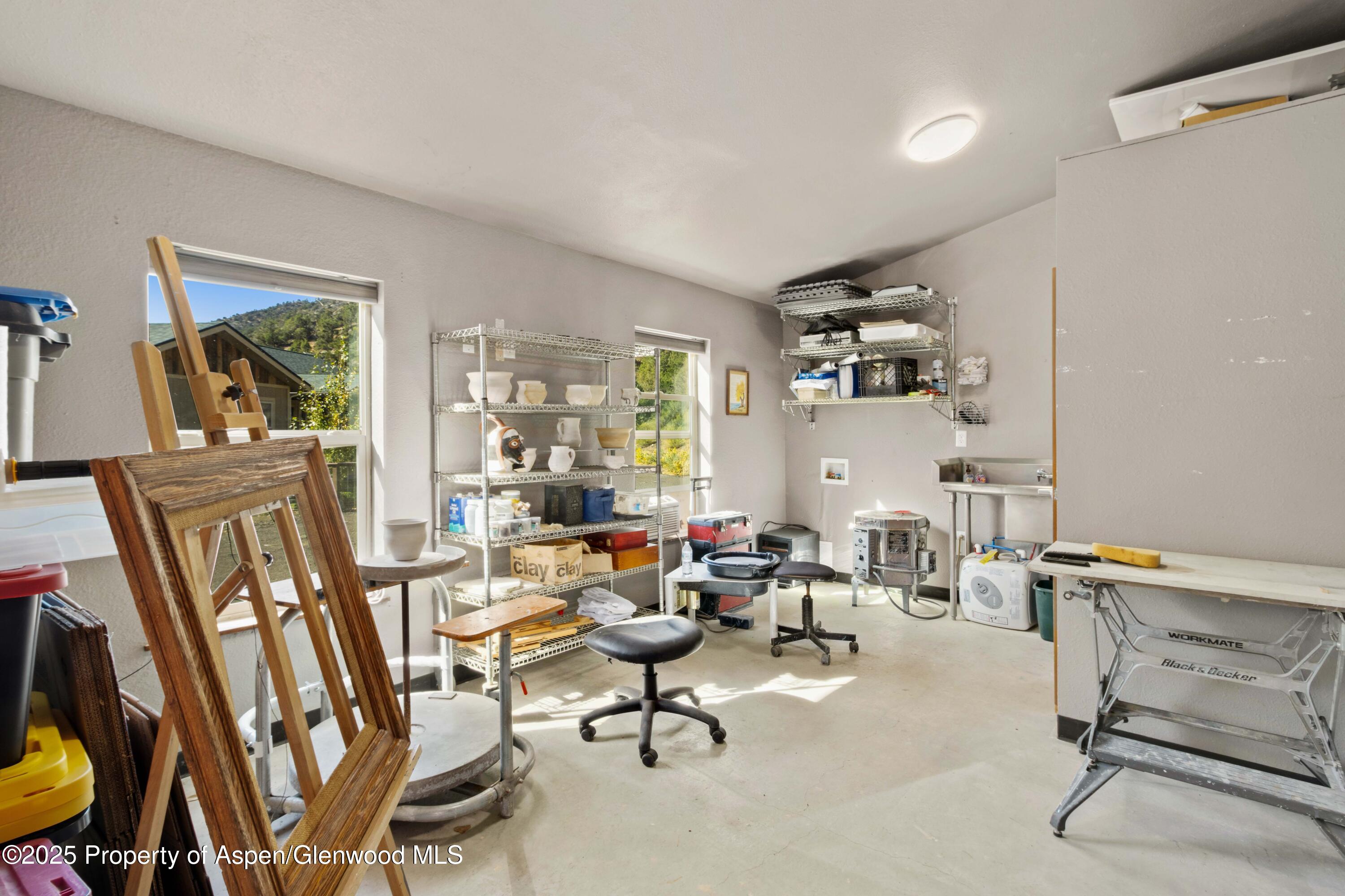 3211 County Road 237 Rifle, CO 81650 - Photo 50 of 56 a living room with furniture and a window