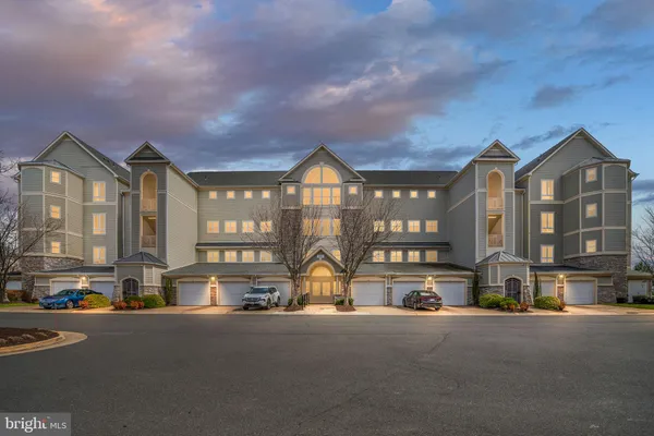 a view of a building with a street