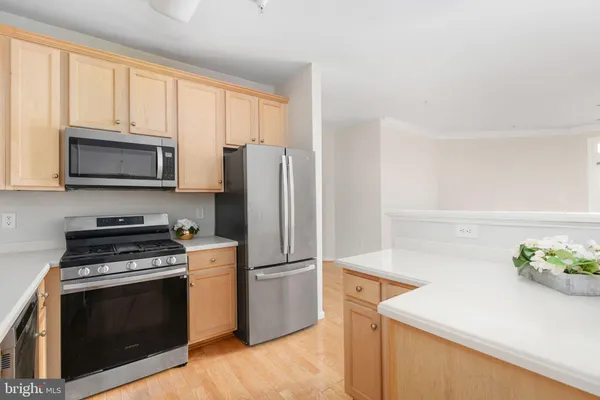 a view of empty room with ceiling fan