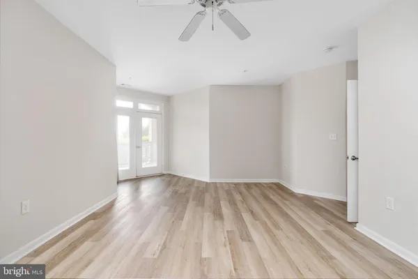 a view of a room with racks on the wall