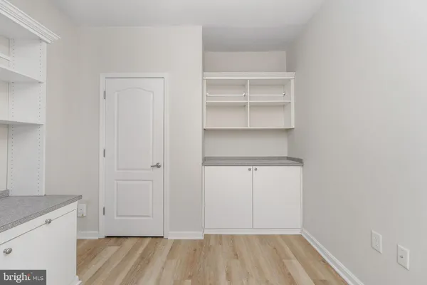 a view of a street with a building in the background