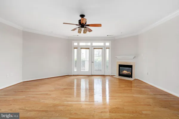 a kitchen with stainless steel appliances a stove a microwave and a refrigerator