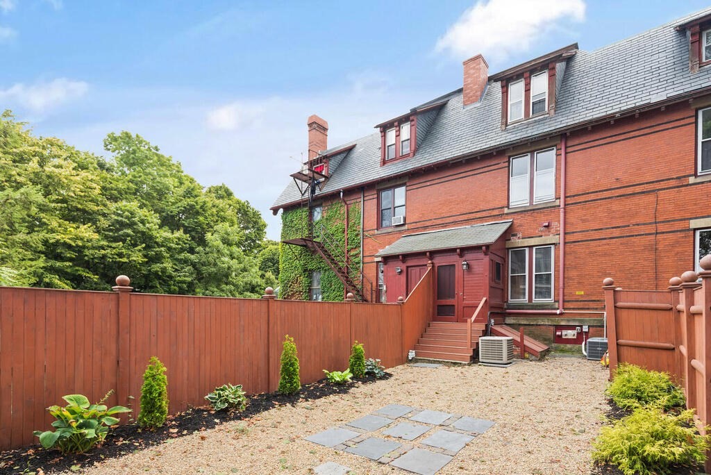 2 Rangeley Road, Unit 2 Winchester, MA 01890 - Photo 27 of 29 a backyard of a house