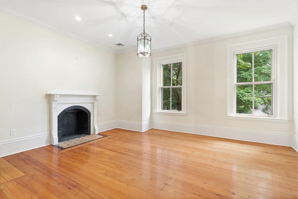 2 Rangeley Road, Unit 2 Winchester, MA 01890 - Photo 7 of 29 a view of empty room with window and fireplace