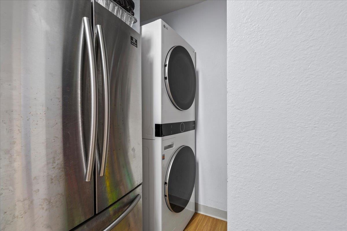 480 Kenolio Road, Unit 1103 Kihei, HI 96753 - Photo 16 of 32 a utility room with dryer and washer