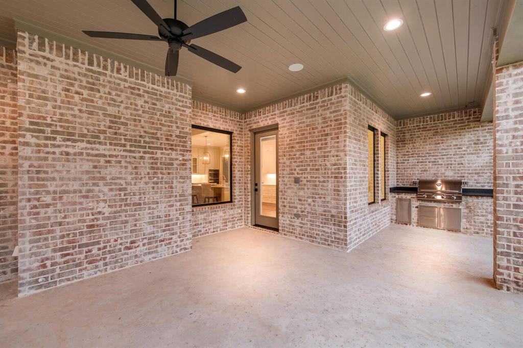 8005 Bee Cave Road China Spring, TX 76633 - Photo 6 of 40 a view of an empty room with a fireplace