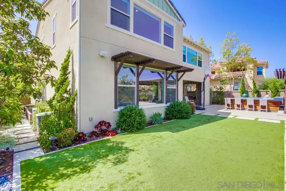 15501 Tanner Ridge Road San Diego, CA 92127 - Photo 16 of 18 a view of a building with a yard