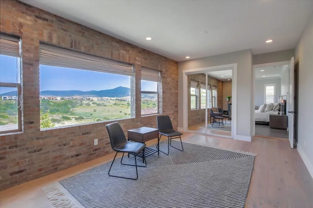 15501 Tanner Ridge Road San Diego, CA 92127 - Photo 2 of 18 a living room with furniture and a large window