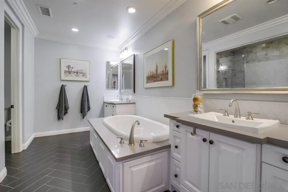 15501 Tanner Ridge Road San Diego, CA 92127 - Photo 10 of 18 a bathroom with a sink and a mirror