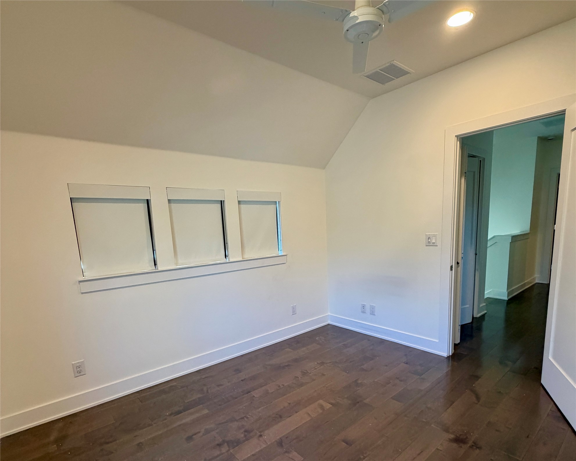 1515 Hether Street, Unit B Austin, TX 78704 - Photo 20 of 30 A quiet retreat with rich hardwood flooring and sloped ceilings offers a serene escape.