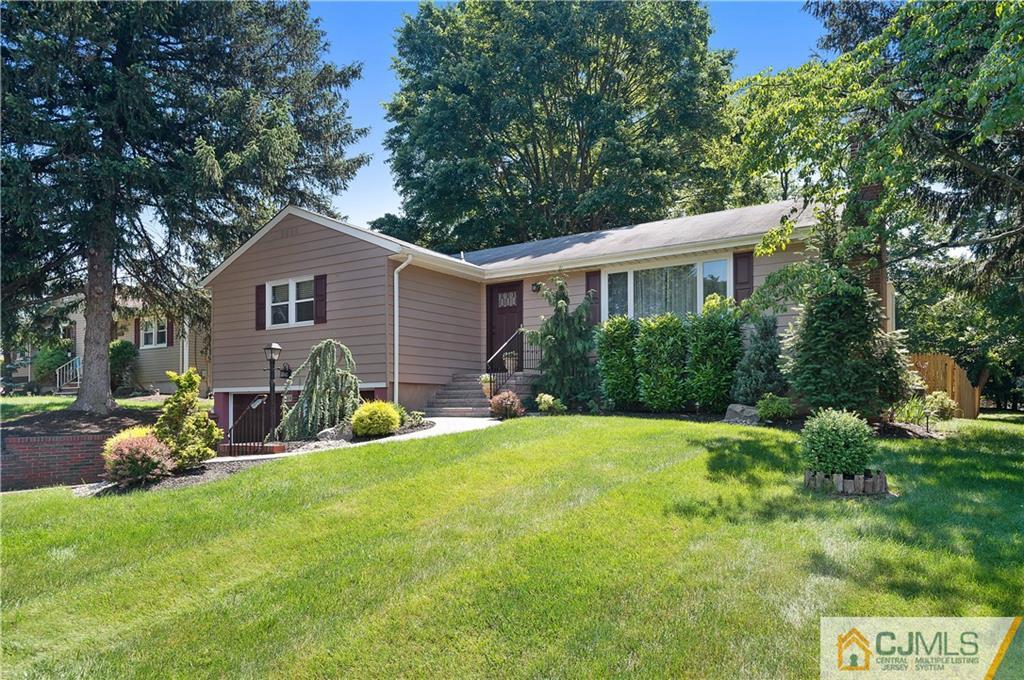 764 Old Raritan Road Edison, NJ 08820 - Photo 1 of 20 a view of a house with a yard and sitting area