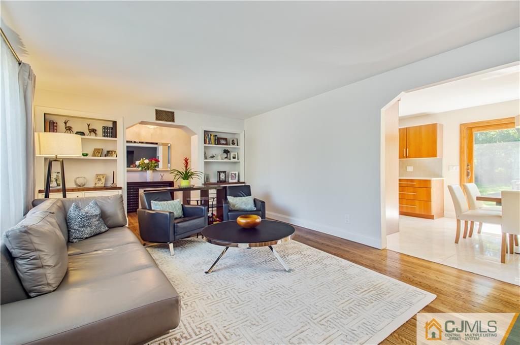 764 Old Raritan Road Edison, NJ 08820 - Photo 4 of 20 a living room with furniture and a couch