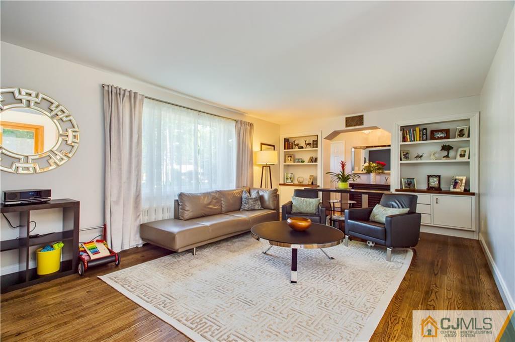 764 Old Raritan Road Edison, NJ 08820 - Photo 5 of 20 a living room with furniture and a wooden floor