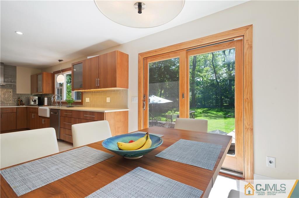 764 Old Raritan Road Edison, NJ 08820 - Photo 9 of 20 a view of kitchen with dining room and wooden floor