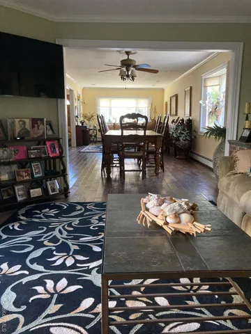 a kitchen with stainless steel appliances granite countertop a sink and a refrigerator