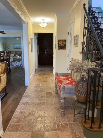 a stove top oven sitting inside of a kitchen