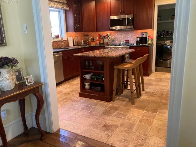 a bathroom with a toilet and a sink