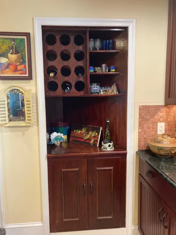 a view of a living room and wooden floor