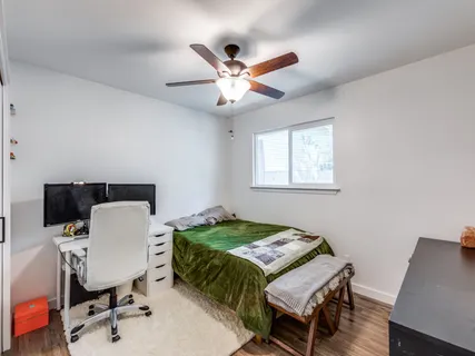 a workspace with furniture and a window