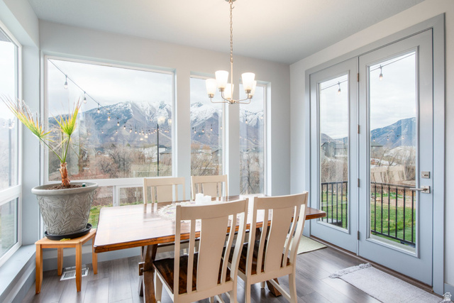 262 North Santa Fe Drive Mapleton, UT 84664 - Photo 14 of 28 Dining space with a mountain view, healthy amount of natural light, and wood finished floors