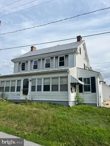 a house view with a garden space