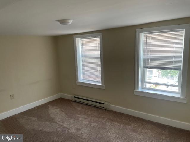 22429 Goose Street, Unit B Cavetown, MD 21783 - Photo 14 of 16 an empty room with windows