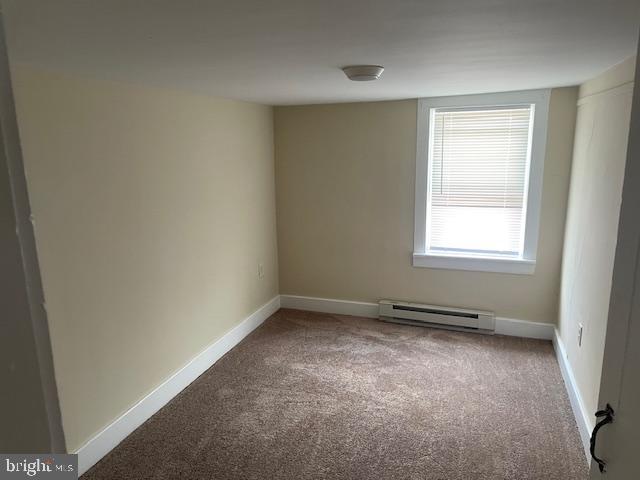 22429 Goose Street, Unit B Cavetown, MD 21783 - Photo 3 of 16 an empty room with a window