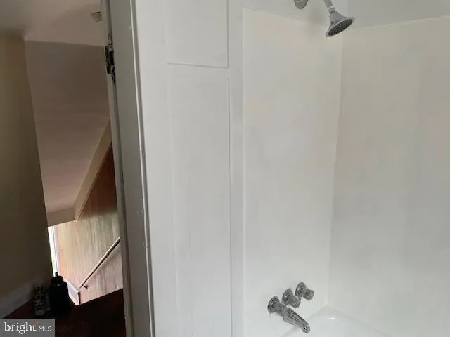 a bathroom with a bathtub