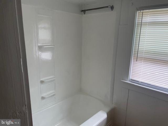 22429 Goose Street, Unit B Cavetown, MD 21783 - Photo 9 of 16 a bathroom with a bathtub