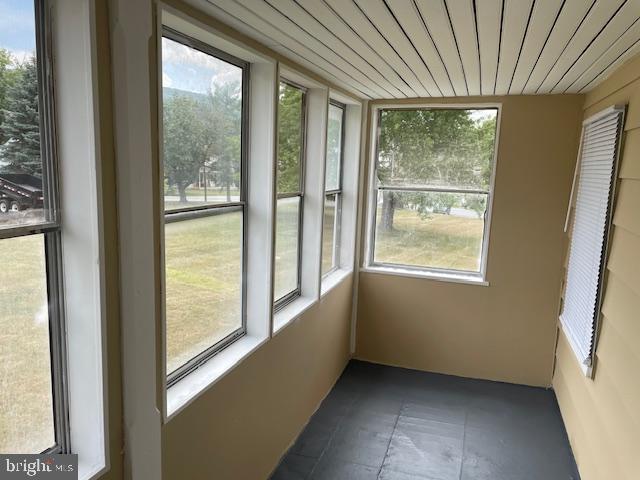 22429 Goose Street, Unit B Cavetown, MD 21783 - Photo 10 of 16 a view of an empty room with windows