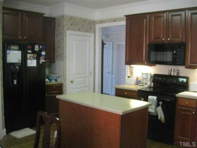 3905 Sunset Maple Court Raleigh, NC 27612 - Photo 6 of 19 Closet is a very ample pantry.