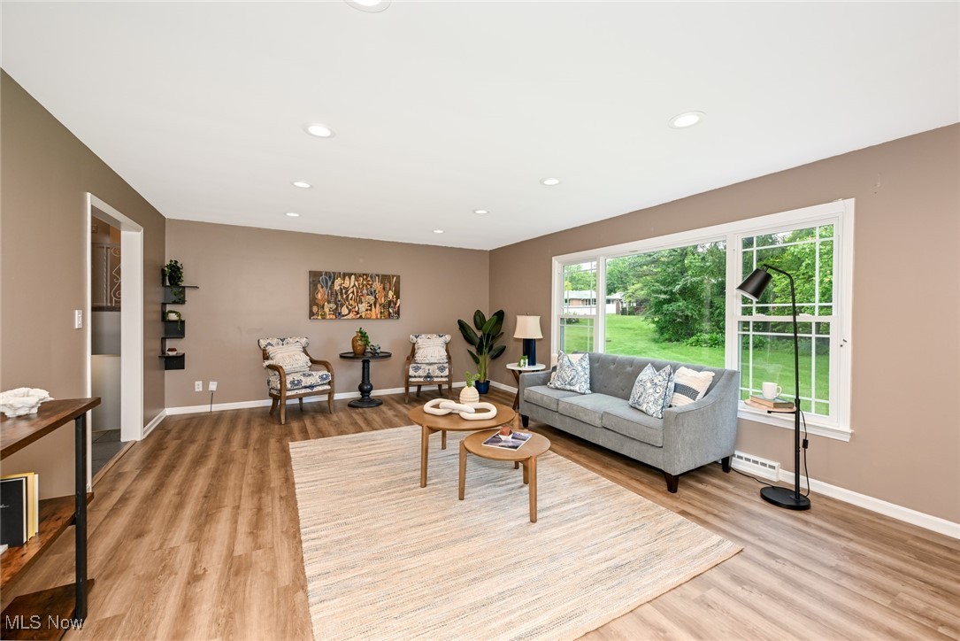 2015 Burlington Road Akron, OH 44313 - Photo 7 of 50 Living area with light wood finished floors, baseboards, and recessed lighting