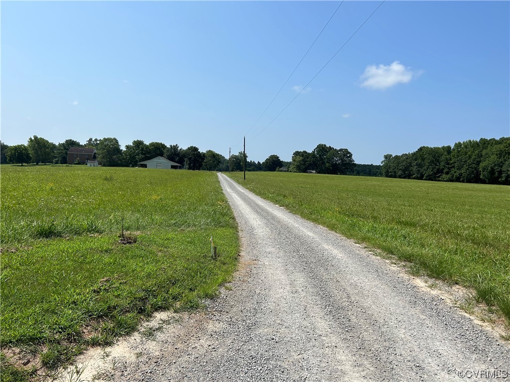 0 Whitehall Road Sandy Hook, VA 23153 - Photo 16 of 16 a view of a golf course with a lake