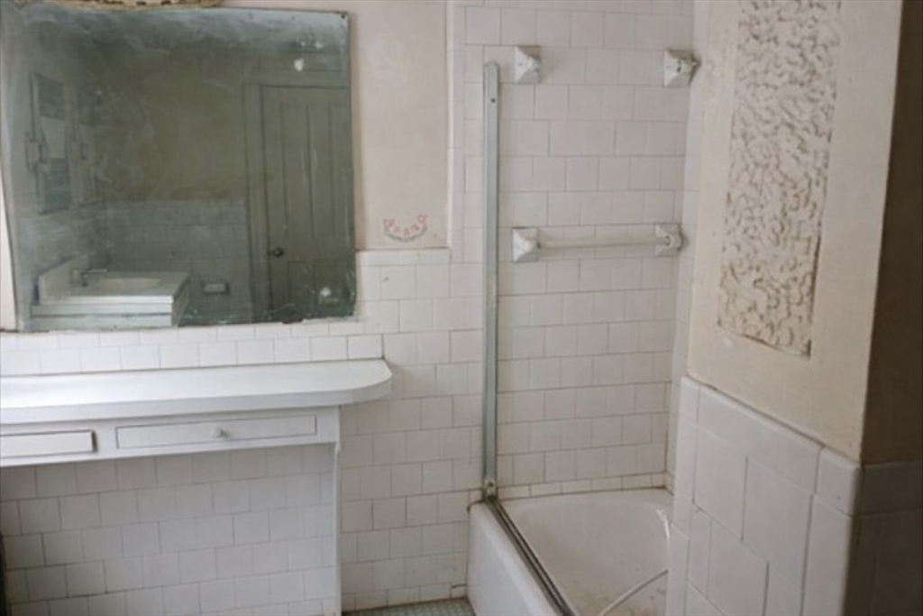 9 Olive Street Ashland, MA 01721 - Photo 20 of 33 a bathroom with a shower and a sink