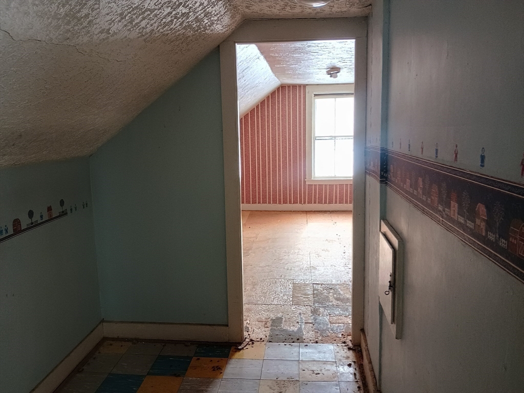 9 Olive Street Ashland, MA 01721 - Photo 22 of 33 a view of empty room with windows