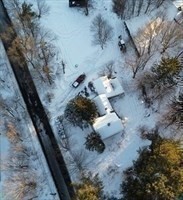9 Olive Street Ashland, MA 01721 - Photo 31 of 33 a view of a dry yard with wooden fence