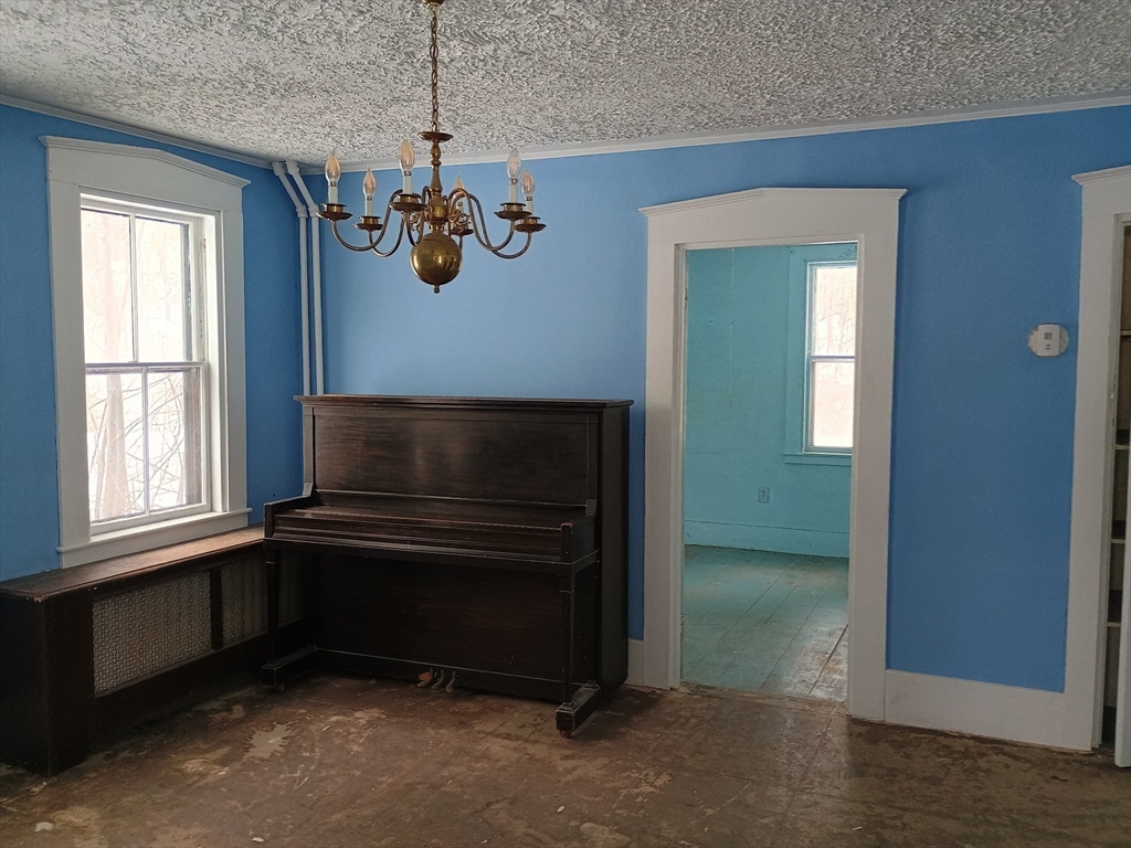 9 Olive Street Ashland, MA 01721 - Photo 10 of 33 a view of room with a window