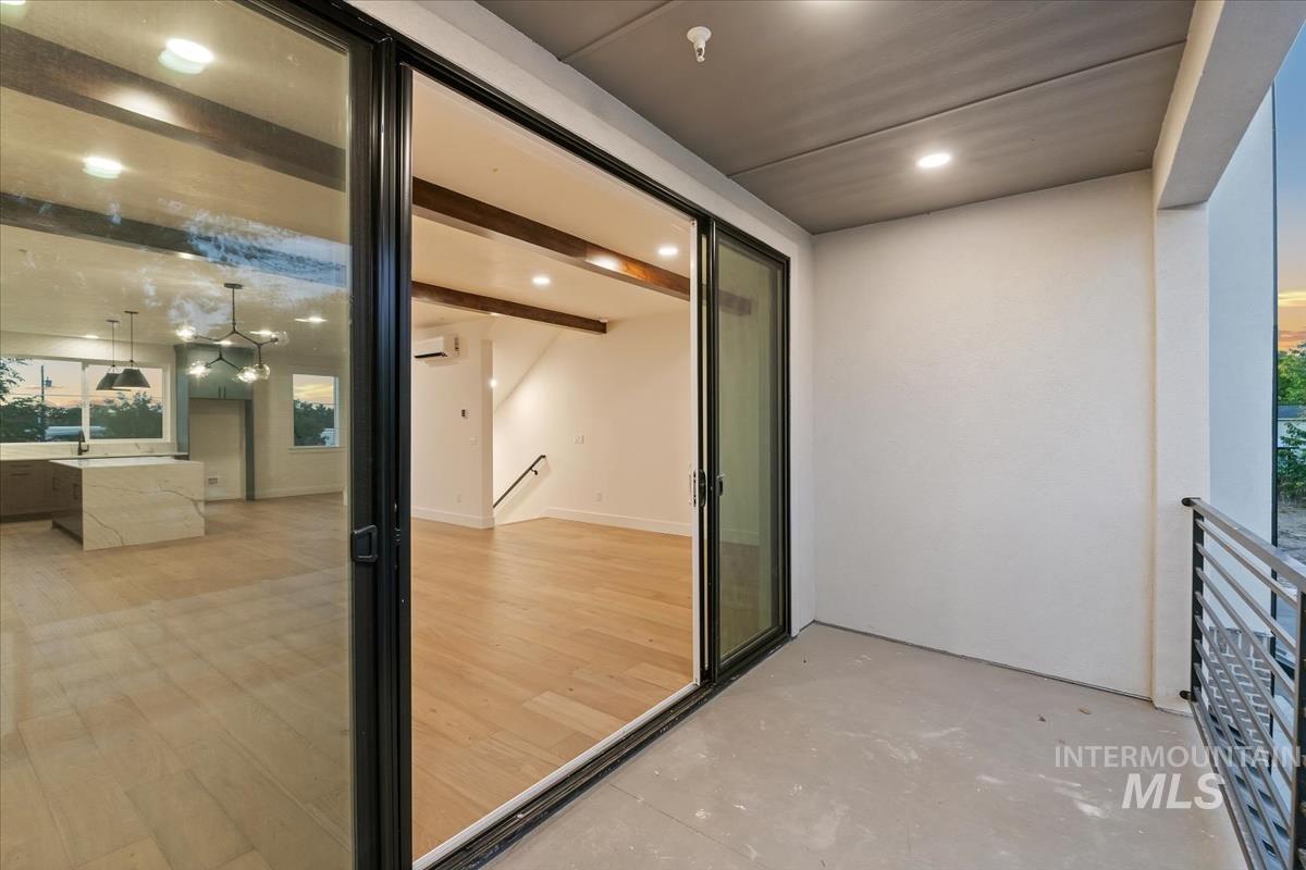 3249 West Moore Street Boise, ID 83702 - Photo 10 of 35 Balcony featuring a wall mounted air conditioner
