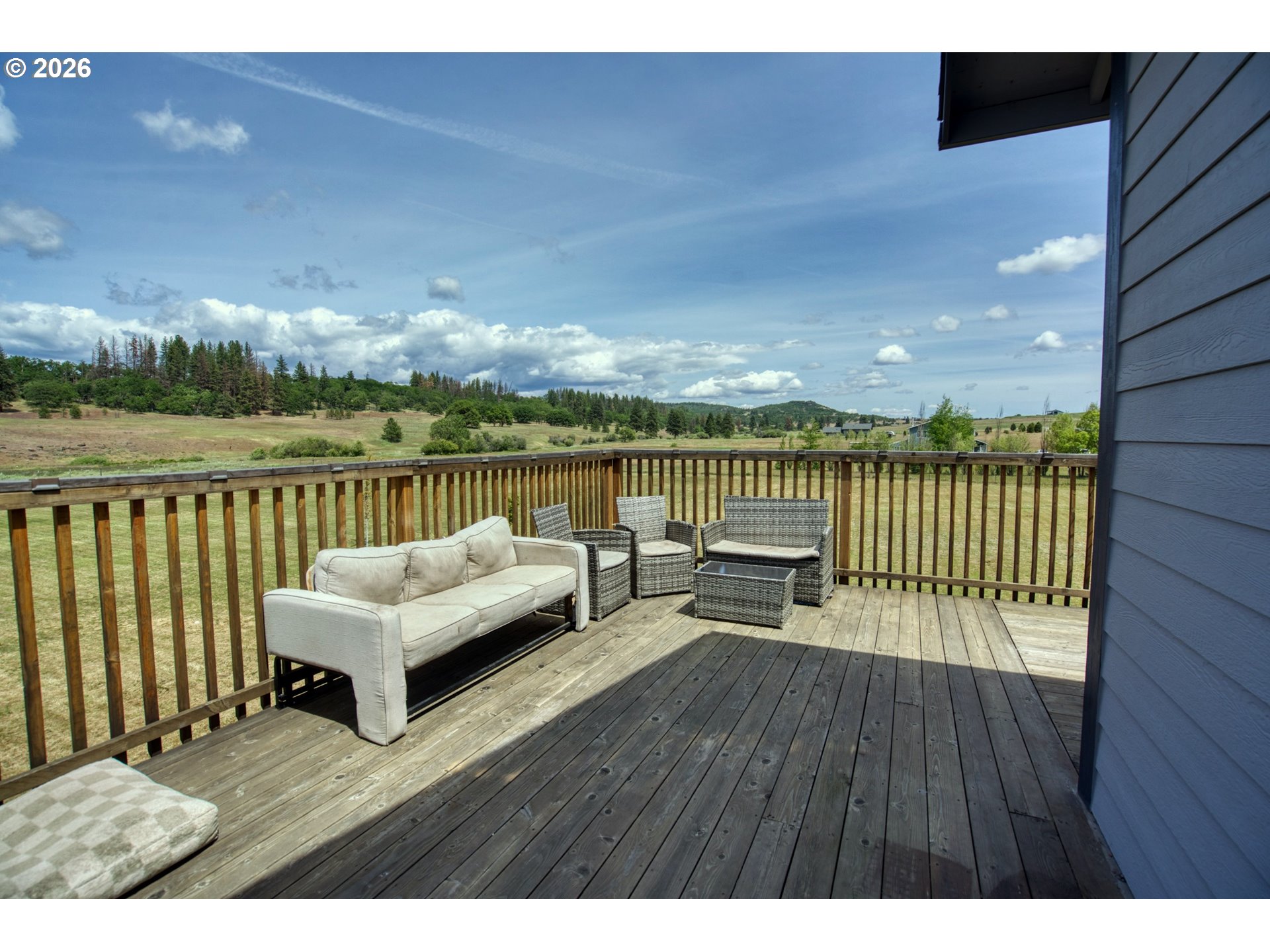 19 Inverness Road Goldendale, WA 98620 - Photo 43 of 48 a view of a terrace with couches and wooden floor