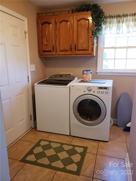 5418 East Lawyers Road Wingate, NC 28174 - Photo 30 of 40 a utility room with dryer and washer
