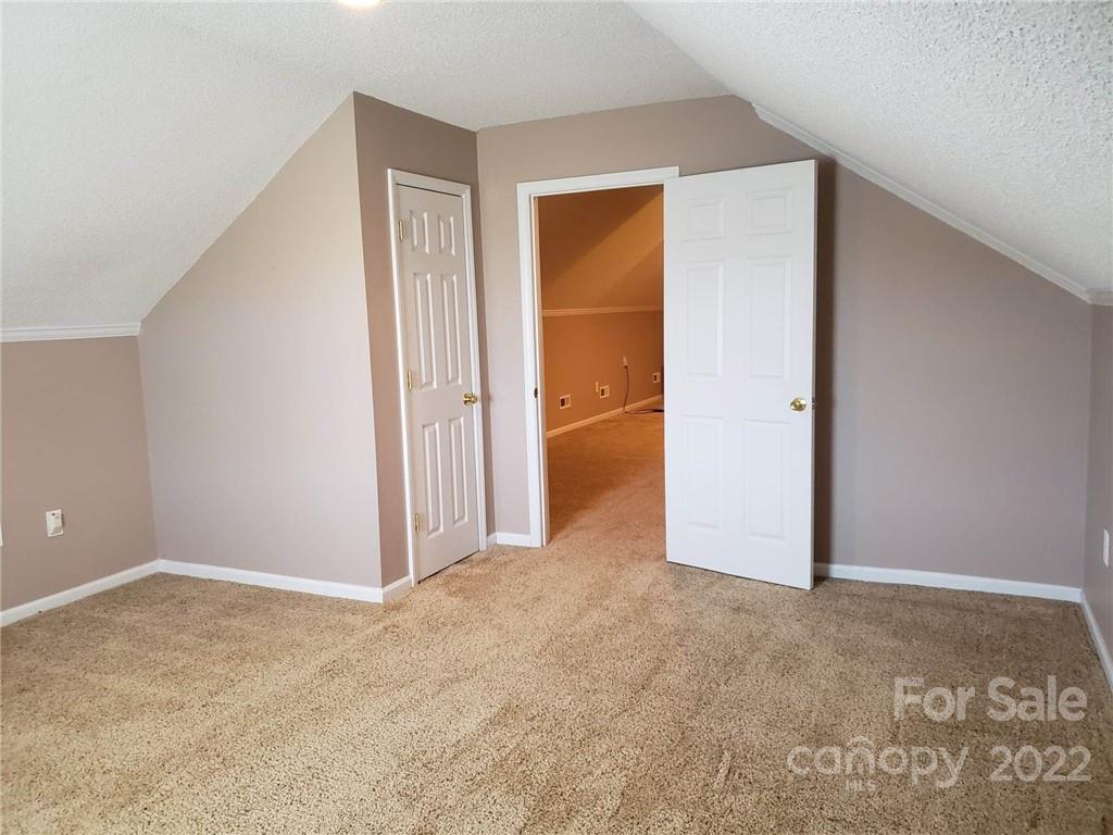 5418 East Lawyers Road Wingate, NC 28174 - Photo 33 of 40 an empty room with closet and a bathroom