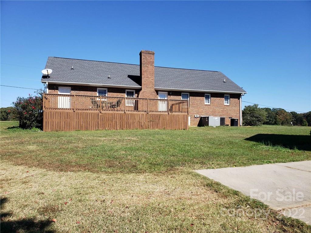 5418 East Lawyers Road Wingate, NC 28174 - Photo 40 of 40 front view of a house with a yard