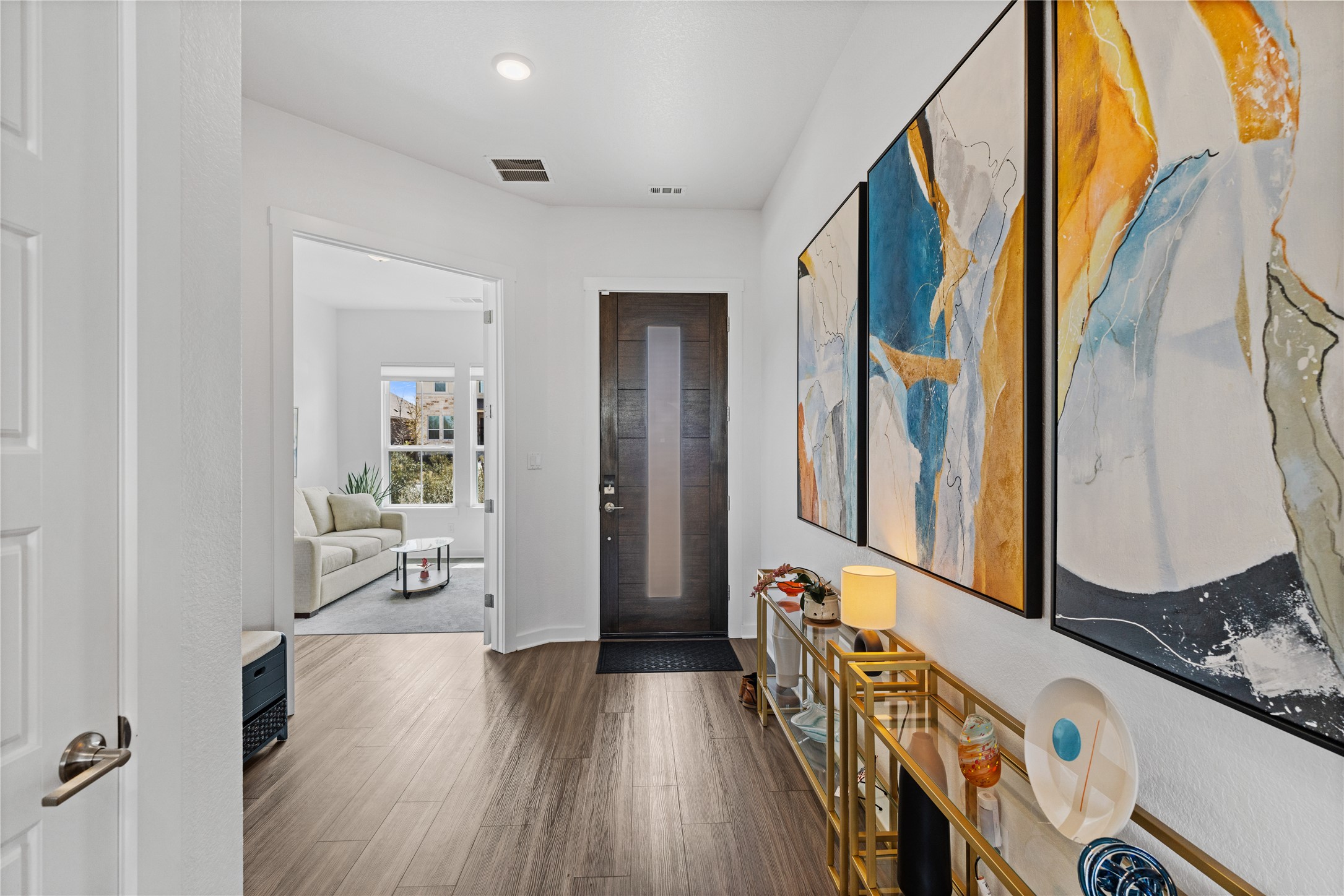 1209 Willie Rnch Way Leander, TX 78641 - Photo 28 of 37 a view of a hallway with wooden floor and staircase