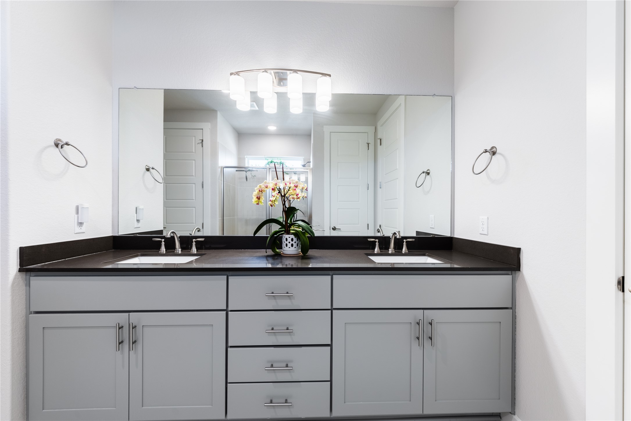 1209 Willie Rnch Way Leander, TX 78641 - Photo 10 of 37 a bathroom with a granite countertop sink and a mirror