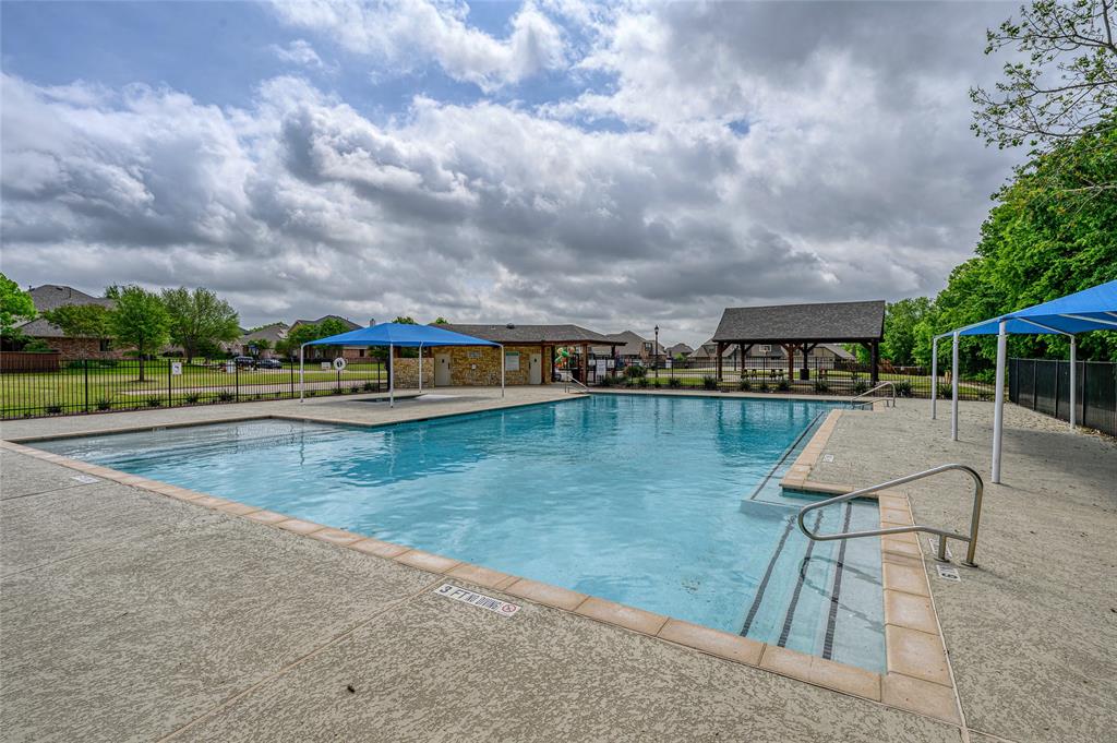 1514 Hanover Lane Van Alstyne, TX 75495 - Photo 37 of 39 Community pool is just around the corner from the home.
